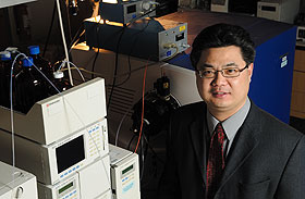 Xudong Yao, assistant professor of chemistry, in his lab. 