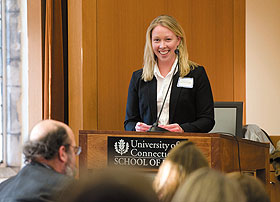 Emily Carroll, LAW ‘09, editor-in-chief of the Connecticut Public Interest Law Journal, gives closing remarks at a symposium on prison reform.