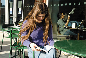 Gretchen Pfisterer, a first-year exploratory major, reads outside the William Benton Museum of Art.