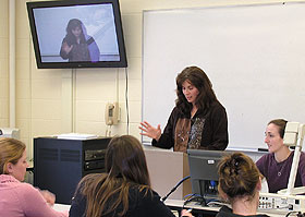 Laura Donorfio, assistant professor of human development and family studies, teaches a class in the Distance Learning Room at the Torrington Campus.