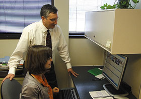Robert Aseltine, director of the Health Center’s Institute for Public Health Research, and Martha Lawless, a student in UConn’s Ph.D. program in public health.