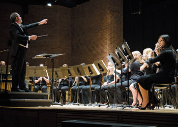 The UConn Symphonic Band, conducted by music professor David Mills, performs at von der Mehden Recital Hall on March 3. 