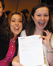 Marta Mieczkowska, right, a fourth-year student at the UConn School of Medicine, celebrates her residency program assignment with a friend at the school’s traditional Match Day ceremony March 19. 