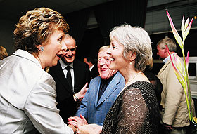 Karen Ryker, right, a professor of dramatic arts, chats with from left, President of Ireland Mary McAleese, her husband Martin, and Paddy Maloney, founder of the Irish musical group The Chieftains, in Dublin after a performance of Mozart’s The Magic Flute that Ryker directed. 