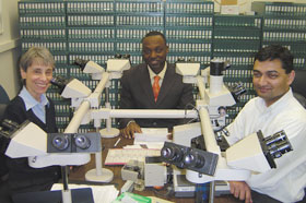 Dr. Ozoemene Obuekwe, center, with Drs. Ellen Eisenberg and Easwar Natarajan. 