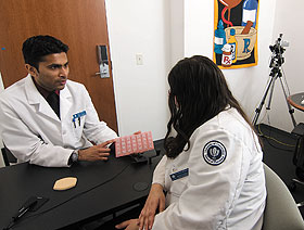 Pharm.D. students Sagar Makanji, left, and Christina Biondo discuss medication management.