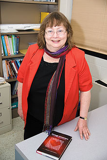 Sarah Glaz, professor of mathematics, with her new book.