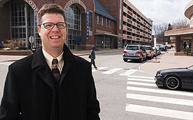 Landscape architect Mark Westa, associate professor of plant science, at the intersection near the UConn Co-op. Westa is conducting a study of the campus that includes the interaction between traffic and pedestrians.