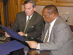 Image: Gov. John G. Rowland and Premier Makhenkesi Stofile