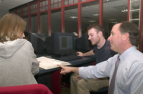 Image: Douglas Cooper with students.