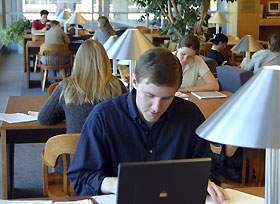 Image: Students find a quiet place to study in the Babbidge Library.