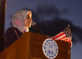 Doaa Ammar addresses the crowd.