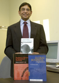 Image: Subhash Jain and the three books he has published in the past three months.