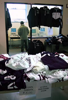 Image: Surplus store display of athletic clothing and computers