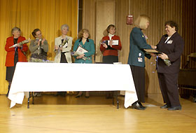 Image: Honorees accept awards during the Celebrate Women program.